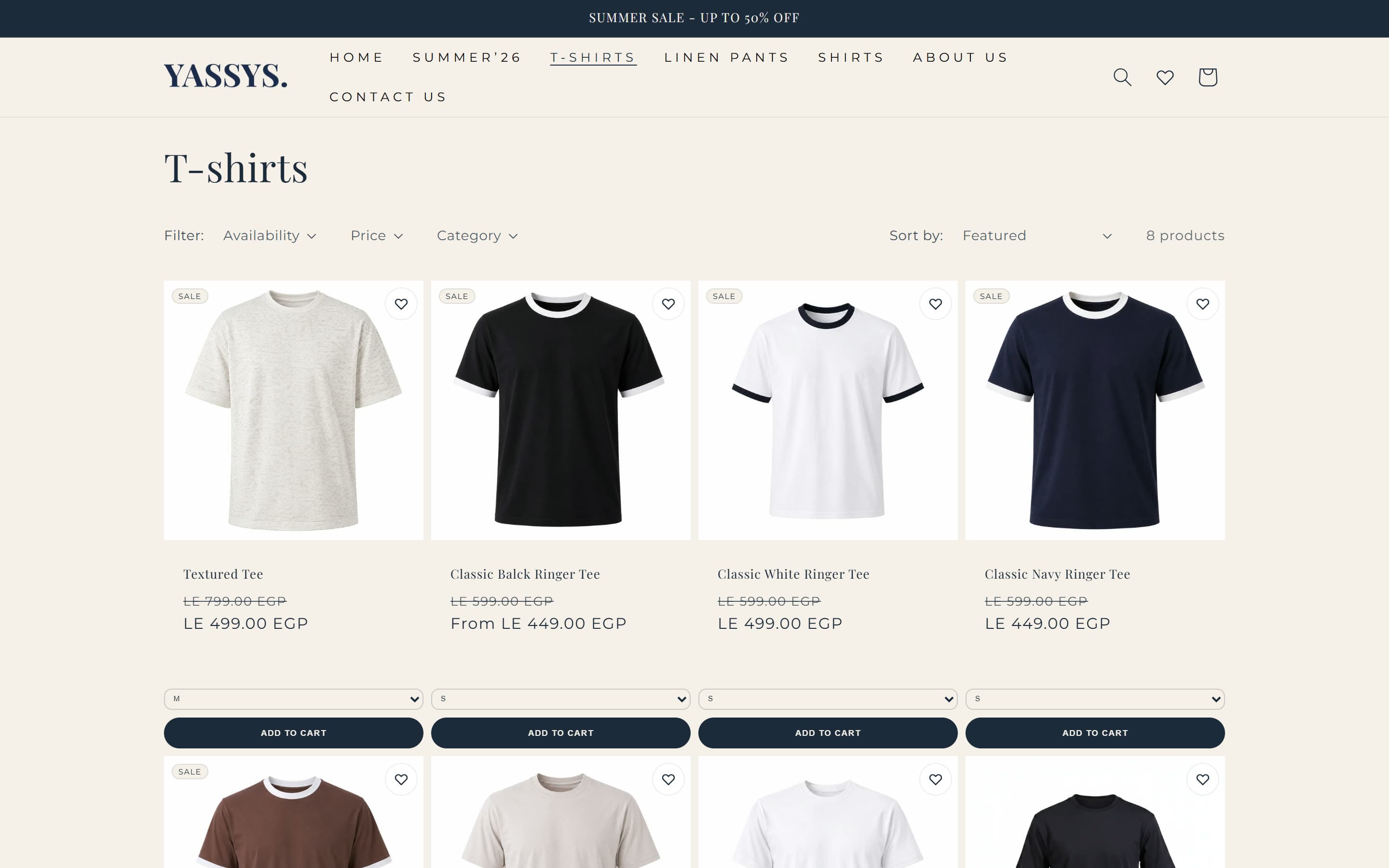 YASSYS t-shirt collection grid with sale badges and wishlist hearts